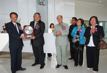 Mr Toru Takahashi presenting Token of Appreciation to Mr Dato' Ismail Salleh, while Dato' Jacob Dungau Sagan and Datin Wong Abayah Ilam looked on.