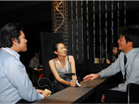 Left - Right: Shoki Itagaki and Misuzu Ishiwatari from Jiji Press mingling with Mr Atsushi Fujimoto.