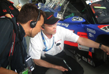  	Mr.Tanaka explaining the Raybrig NSX car to media.