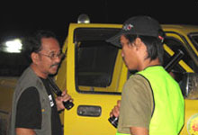 Night Patrolling Wardens inspecting on one of the vehicles entering the jungle